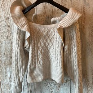 Unique H&M cableknit sweater with ruffles. Great for holiday!